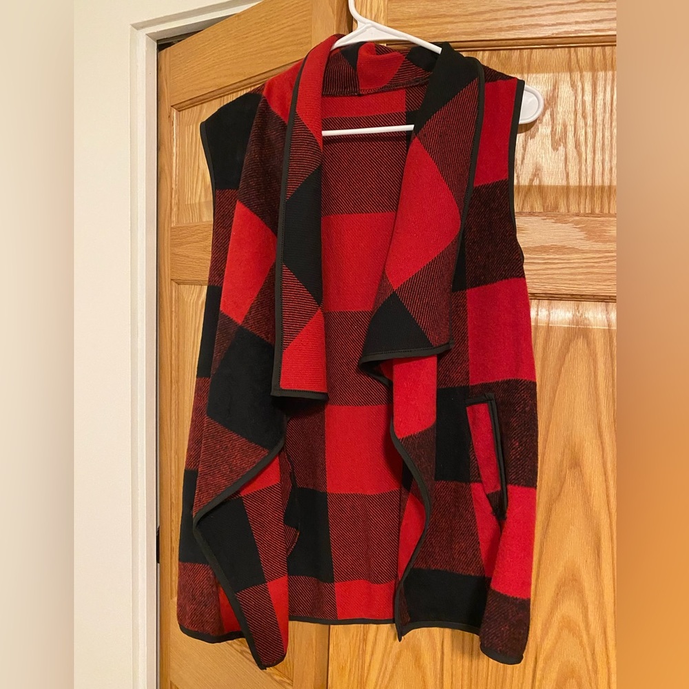 Red and black vest. Size large.